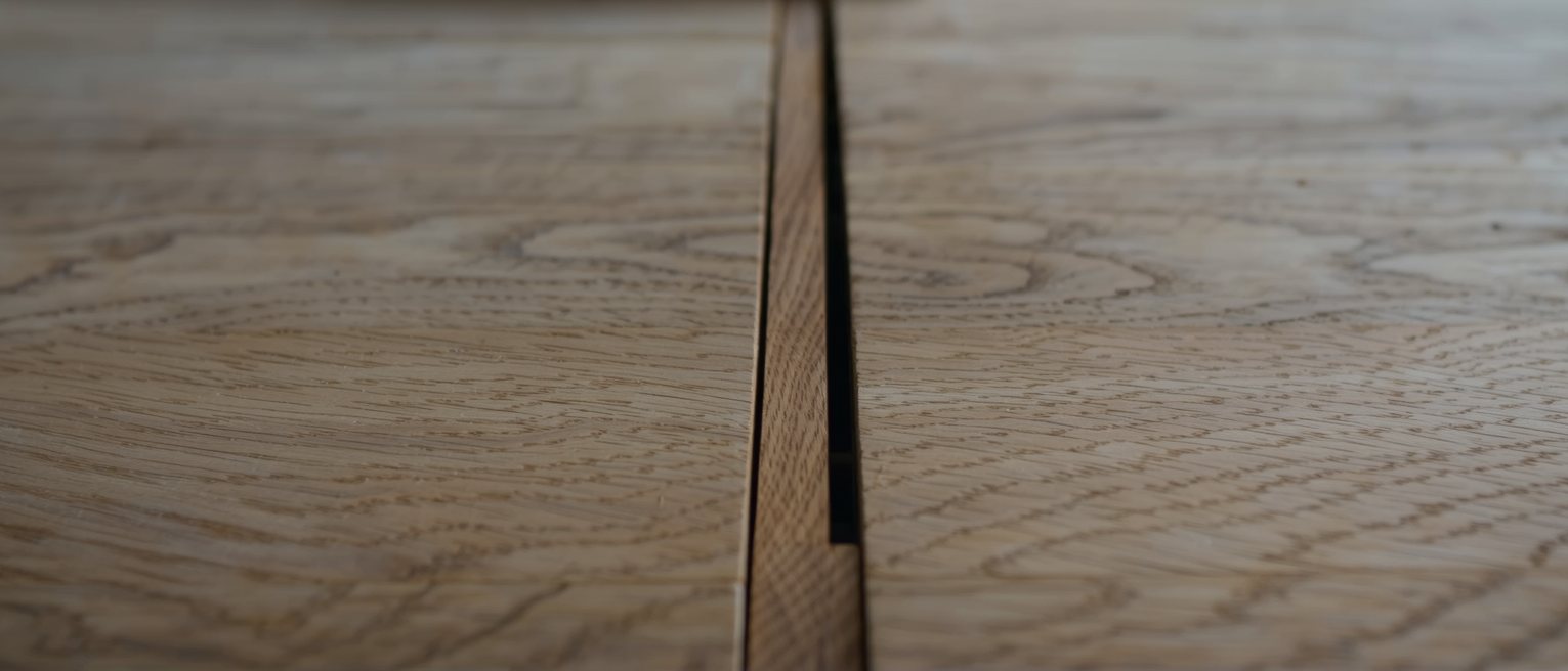 a well-made wooden drawer stopped an inch short of closing, the runner clean and the fit tight