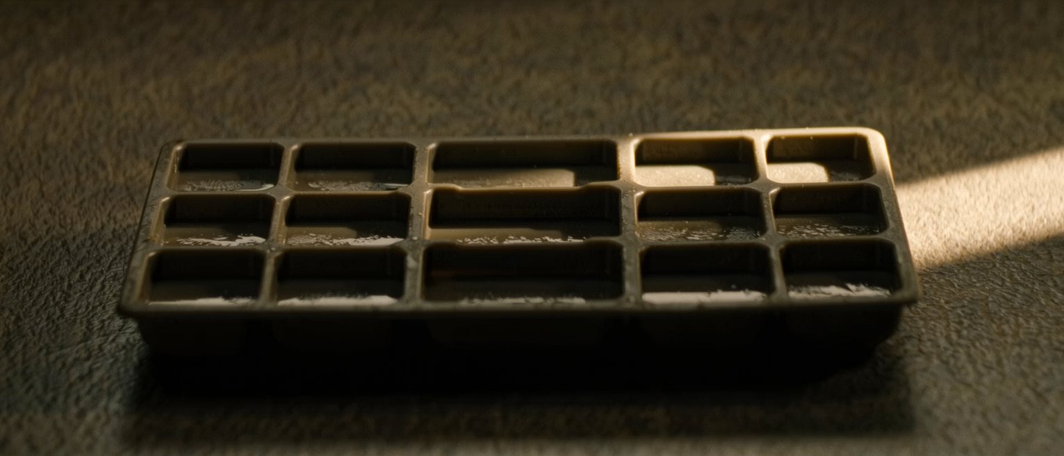a moulded plastic tray of identical compartments, every one the same size and depth