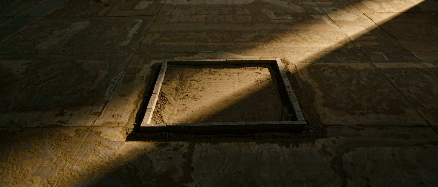 a poured footing with the formwork struck away, the surface true
