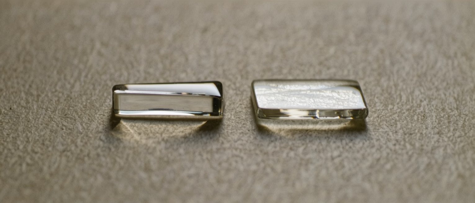 two panes of the same glass, one polished clear and the other left ground matt