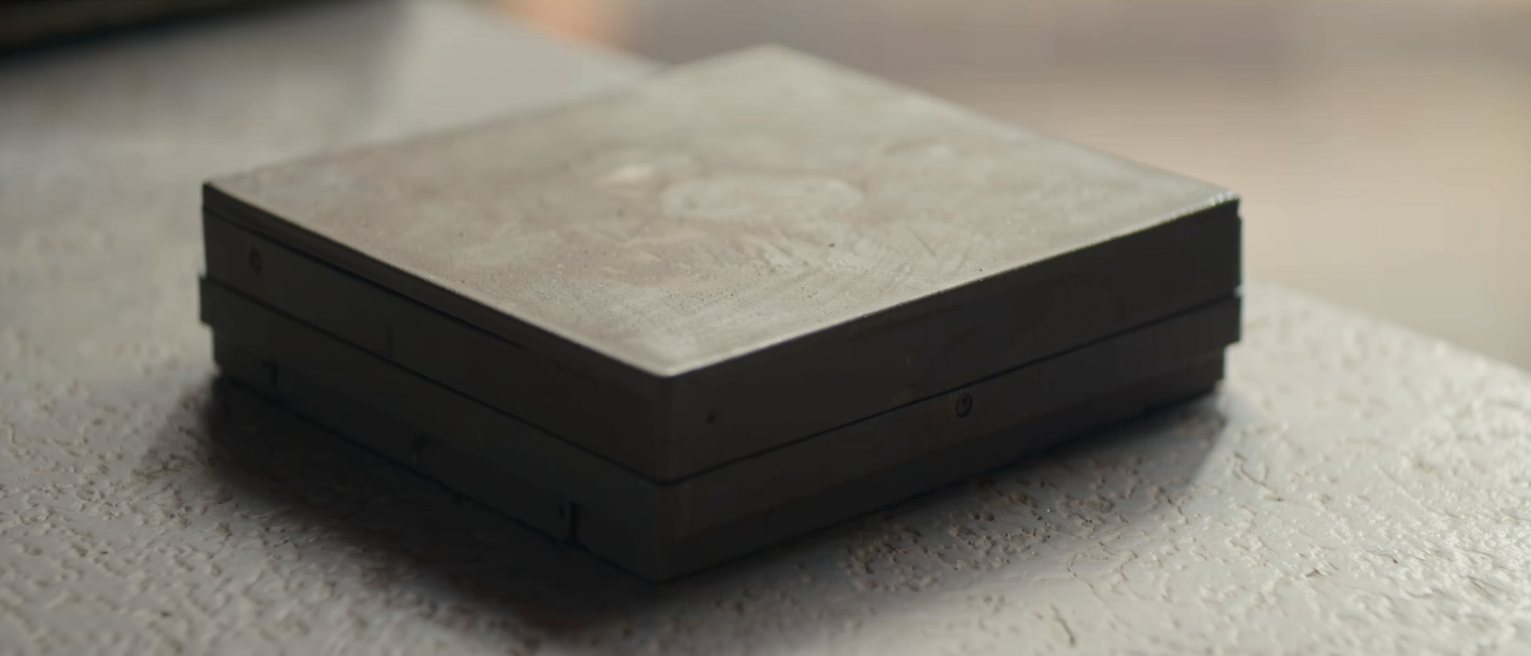 a cast-iron wall box with no hinge and no seam anywhere on it