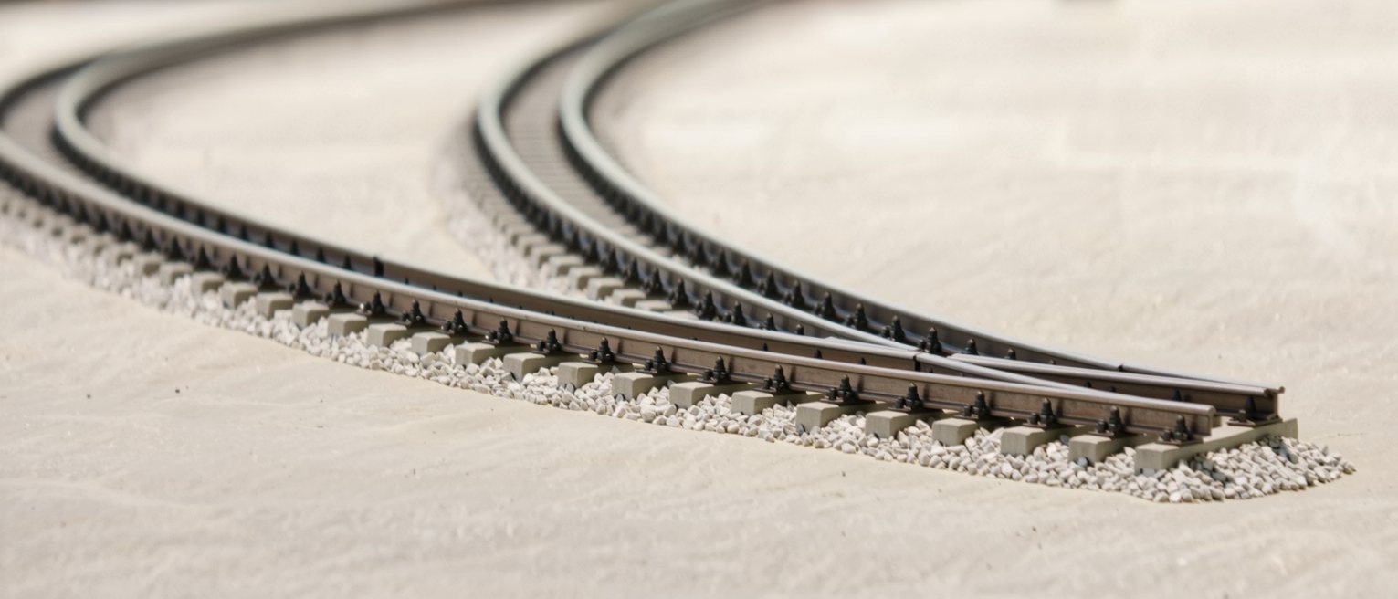 a set of railway points where a second track curves away from the main line