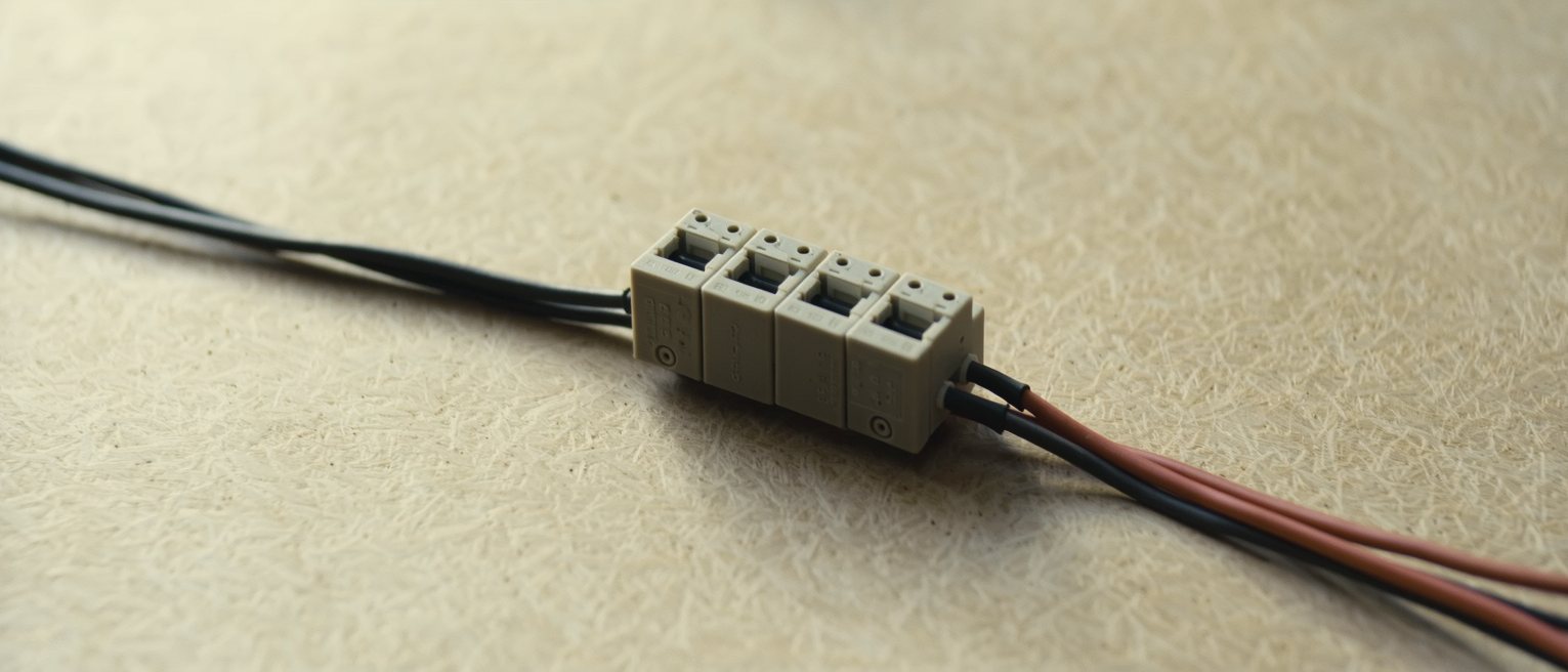 a mains junction box with every circuit run back to one terminal block