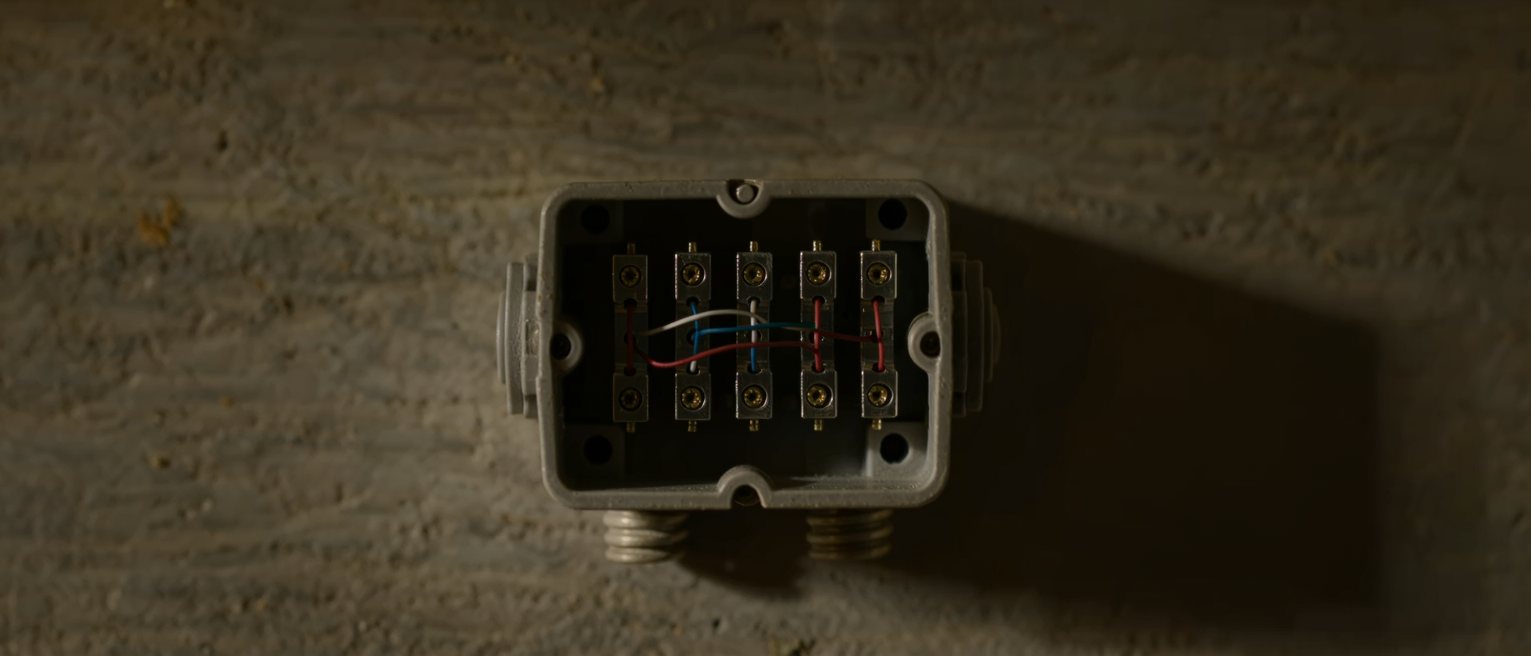 a mains junction box with every circuit run back to one terminal block