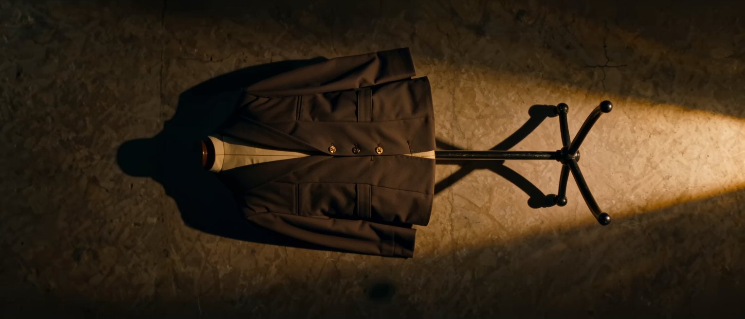 a tailored jacket on a stand, cut to a pattern made for another body