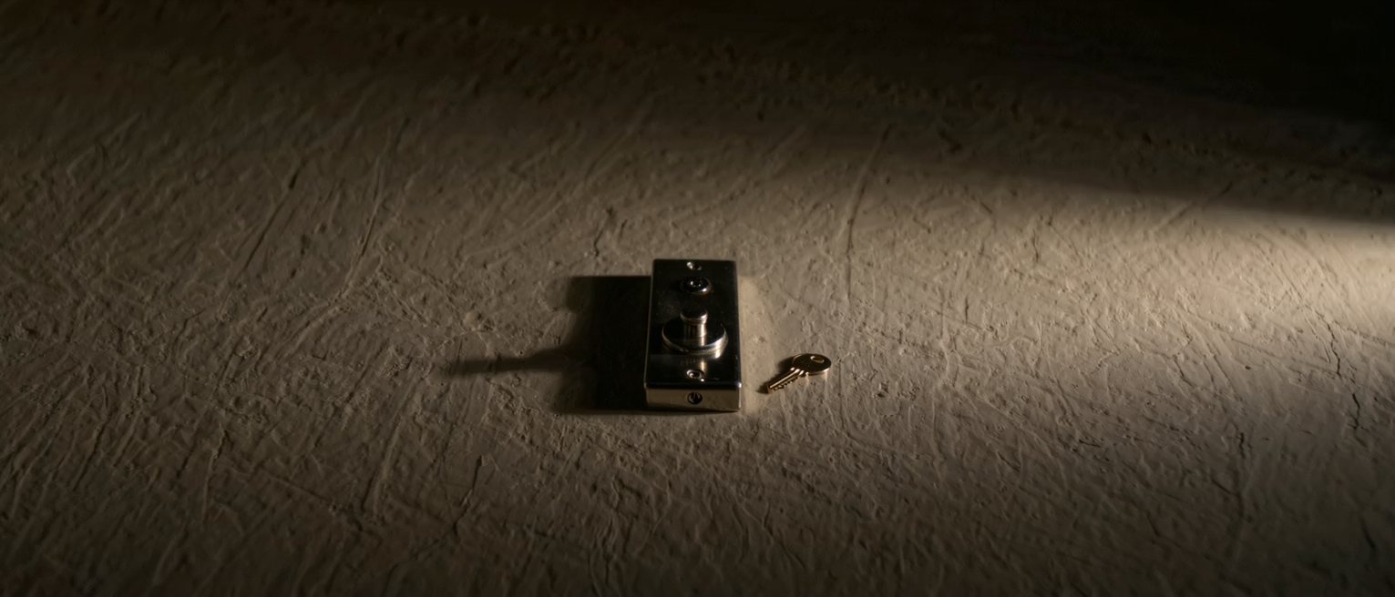 a lock plate seen from behind, its mechanism the same in every door