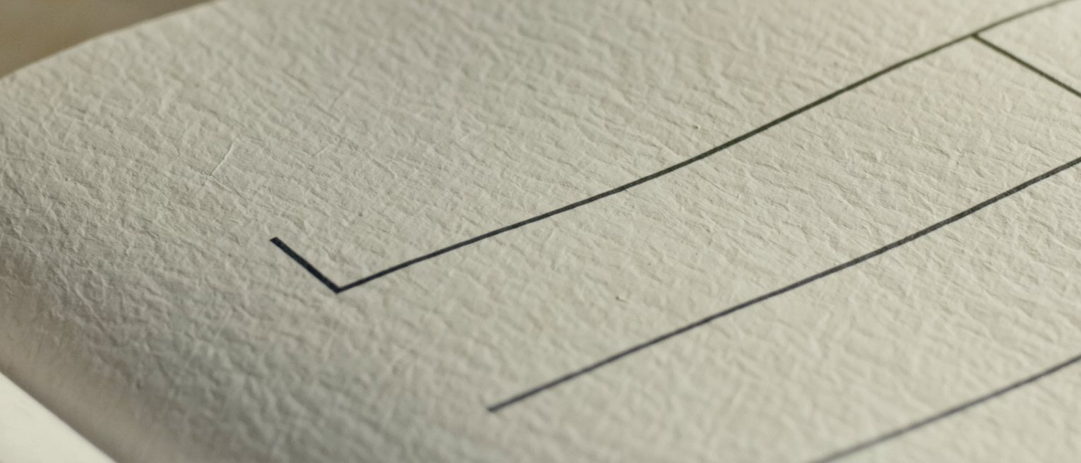 a ledger ruled in two columns, one line entered and the facing column empty